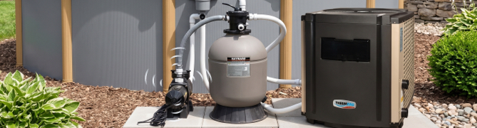 Outdoor pool filtration system with pool pump, sand filter and residential heat pump.